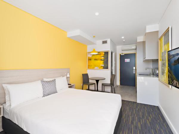 Value Suites Green Square : photo 1 de la chambre suite lit queen-size
