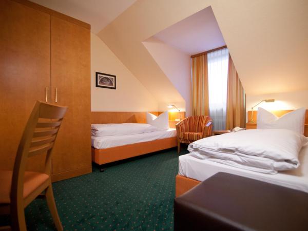 Hotel Grünwald : photo 1 de la chambre chambre lits jumeaux