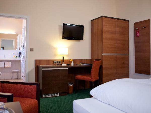 Hotel Grünwald : photo 1 de la chambre chambre triple