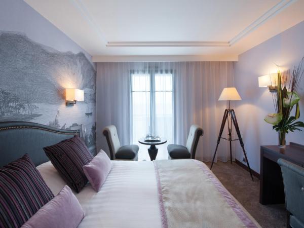 Hôtel Le Nouveau Monde : photo 1 de la chambre chambre double ou lits jumeaux standard - vue sur ville