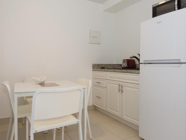 Premiere Hotel : photo 1 de la chambre chambre deluxe avec 2 lits doubles