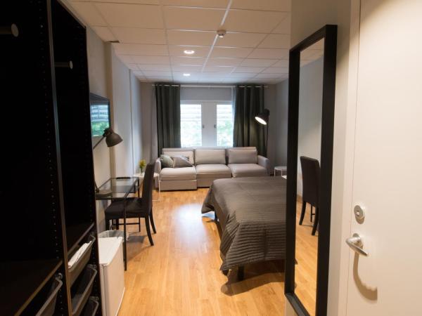 Spoton Hotel : photo 1 de la chambre chambre double de luxe avec canapé-lit