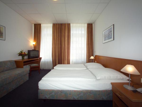 Hotel Lumen am Hauptbahnhof : photo 2 de la chambre chambre triple