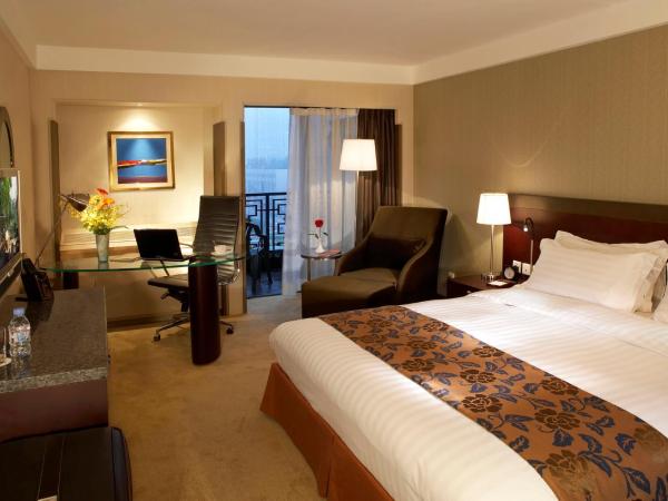 Jianguo Hotel : photo 1 de la chambre chambre lit king-size affaires
