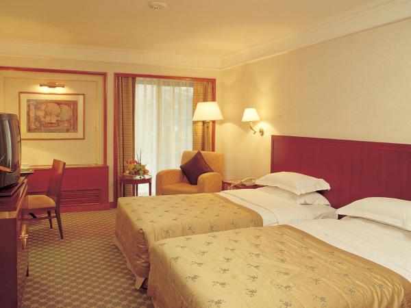 Jianguo Hotel : photo 2 de la chambre chambre lits jumeaux standard