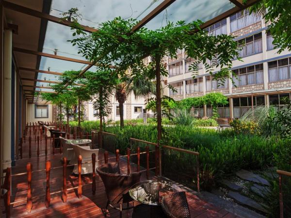 Chengdu Wangjiang Hotel : photo 2 de la chambre chambre double avec jardin