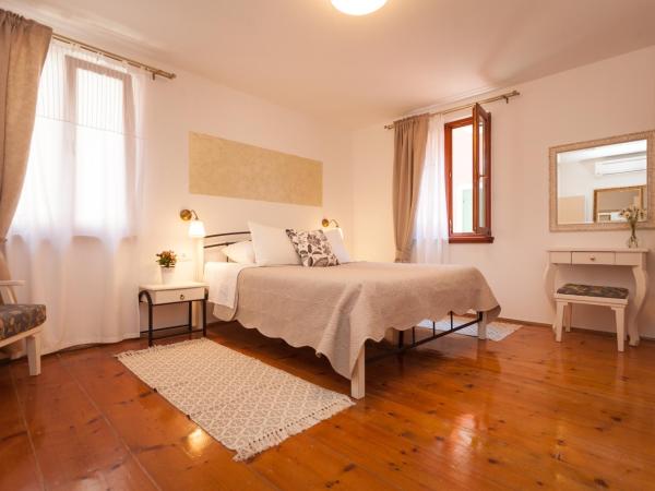 Guesthouse Casa Vittoria : photo 1 de la chambre chambre deluxe