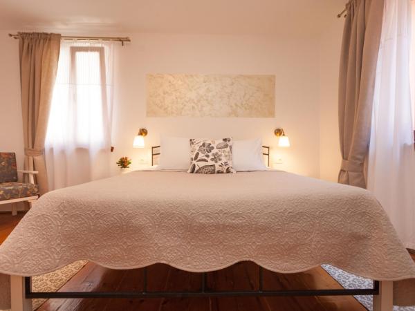 Guesthouse Casa Vittoria : photo 10 de la chambre chambre deluxe