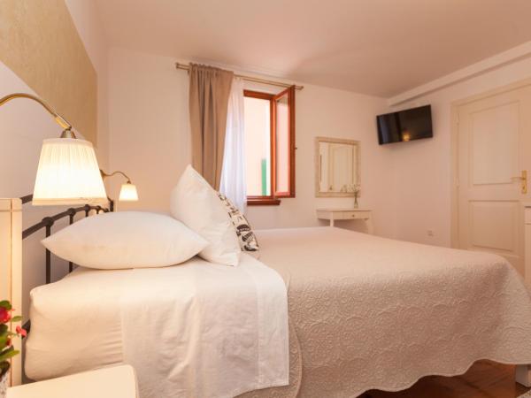 Guesthouse Casa Vittoria : photo 4 de la chambre chambre deluxe