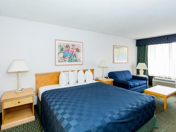 Maingate Lakeside Resort : photo 2 de la chambre chambre lit king-size - vue sur piscine