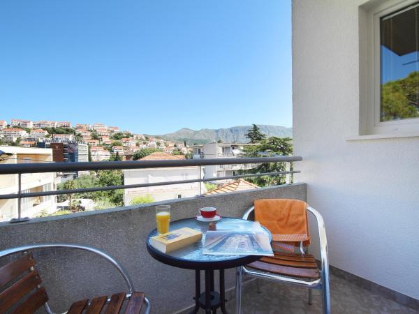 Vukosav Family Apartments and Rooms : photo 10 de la chambre appartement avec balcon