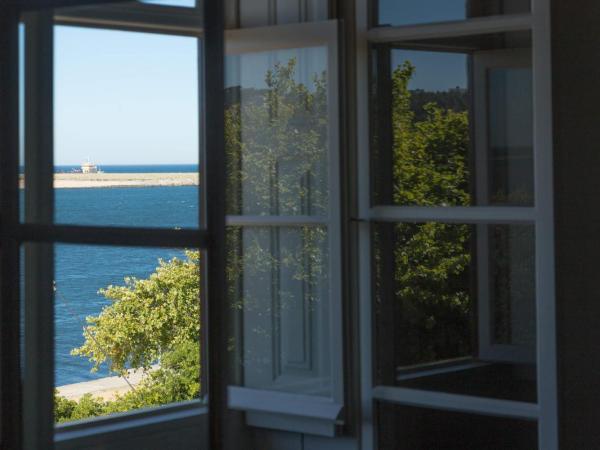Duas Portas Townhouse : photo 6 de la chambre chambre double deluxe - vue sur mer