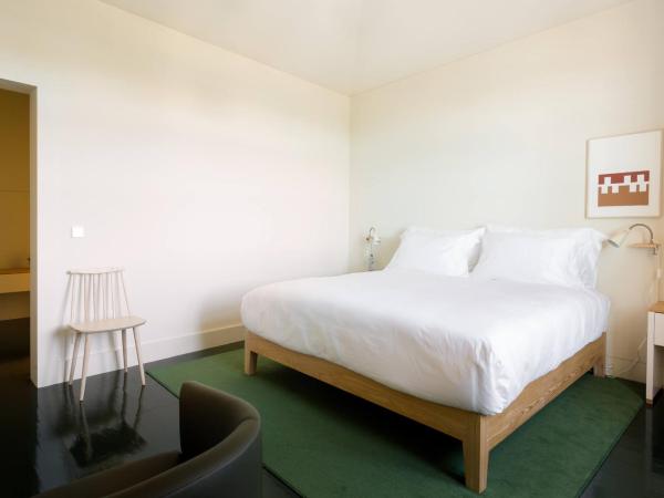 Duas Portas Townhouse : photo 2 de la chambre chambre double de luxe - vue sur rivière et mer