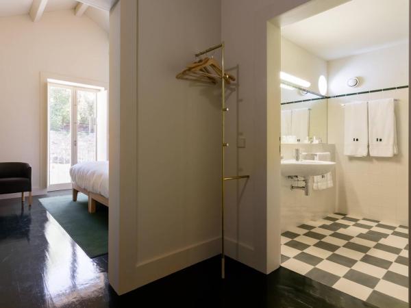 Duas Portas Townhouse : photo 3 de la chambre chambre double deluxe - vue sur jardin