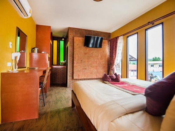 Pongphen Guesthouse - SHA Plus Certified : photo 4 de la chambre chambre double deluxe