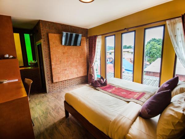 Pongphen Guesthouse - SHA Plus Certified : photo 5 de la chambre chambre double deluxe