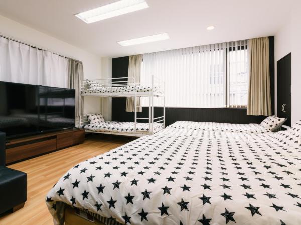 Guest House Yasuragi Hakataekimae : photo 3 de la chambre chambre familiale deluxe