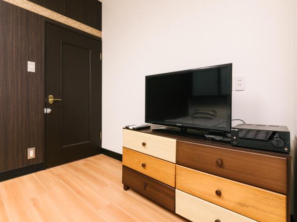 Guest House Yasuragi Hakataekimae : photo 1 de la chambre chambre familiale supérieure