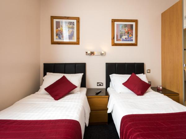 Adria Hotel : photo 10 de la chambre chambre lits jumeaux avec salle de bains privative