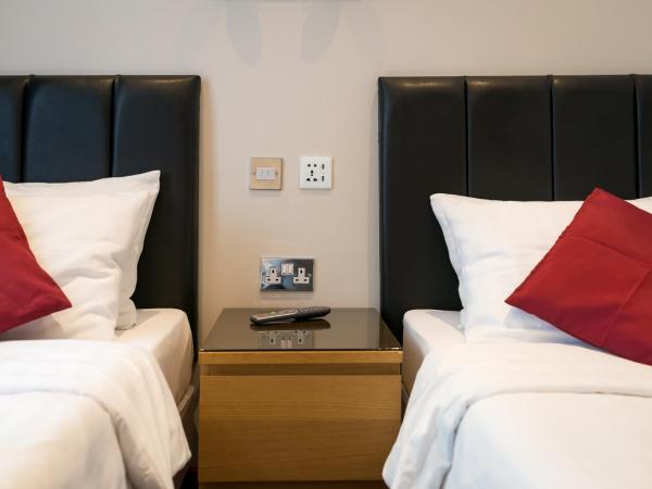 Adria Hotel : photo 6 de la chambre chambre lits jumeaux avec salle de bains privative