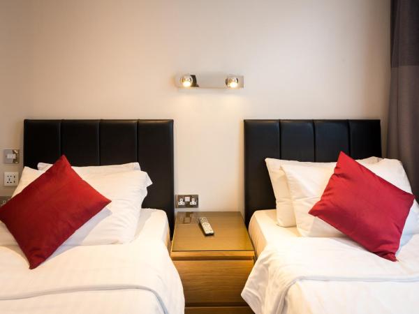 Adria Hotel : photo 4 de la chambre chambre lits jumeaux avec salle de bains privative