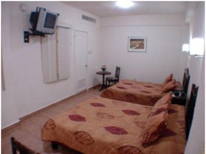 Hotel 5a Avenida : photo 4 de la chambre chambre lits jumeaux