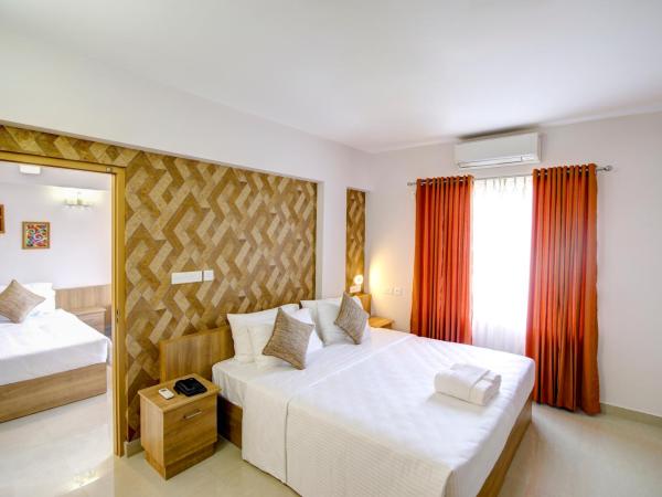 Sidra Pristine Hotel and Portico Halls : photo 3 de la chambre chambre familiale avec balcon