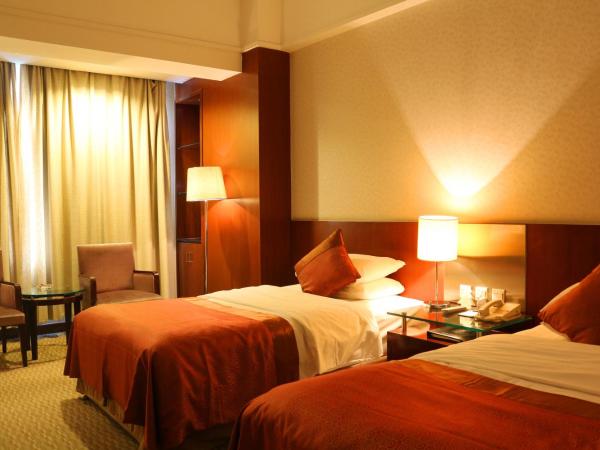 Jinling Jingyuan Plaza : photo 2 de la chambre chambre lits jumeaux deluxe