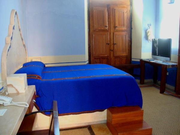 Hotel Boutique Casa San Angel : photo 8 de la chambre suite lit queen-size avec baignoire spa