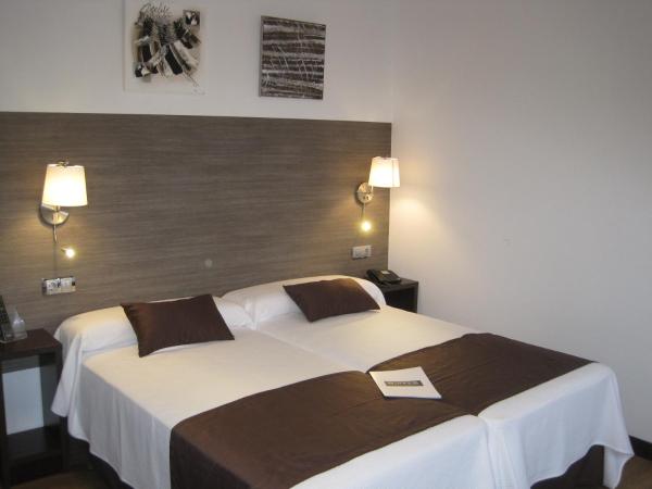 Suites Coruña : photo 1 de la chambre chambre triple