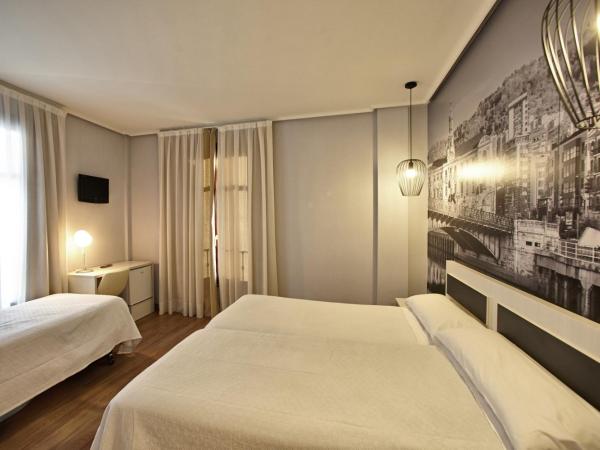 Hotel Sirimiri : photo 1 de la chambre chambre triple