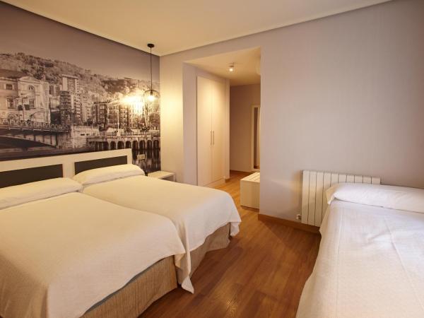 Hotel Sirimiri : photo 2 de la chambre chambre triple