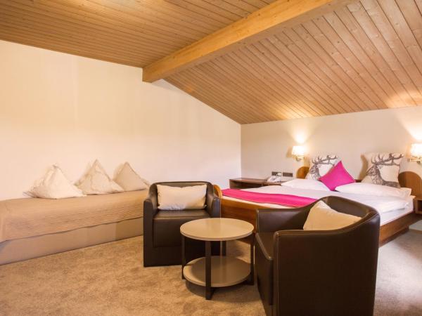 Hotel Garni Römerhof : photo 1 de la chambre chambre triple avec balcon