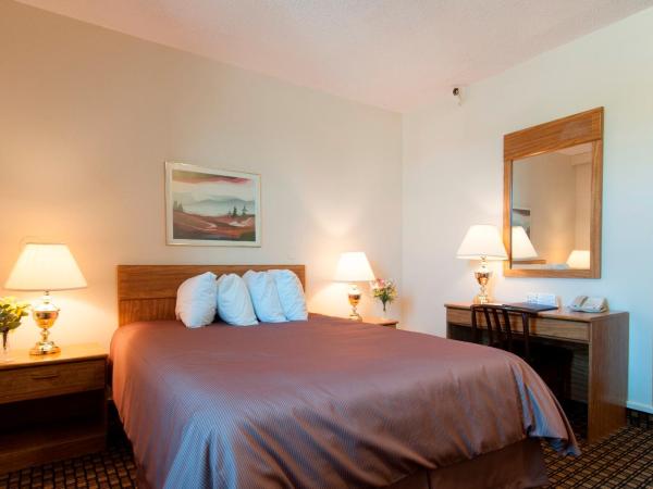 Assiniboine Gordon Inn on the Park : photo 4 de la chambre chambre lit queen-size Économique