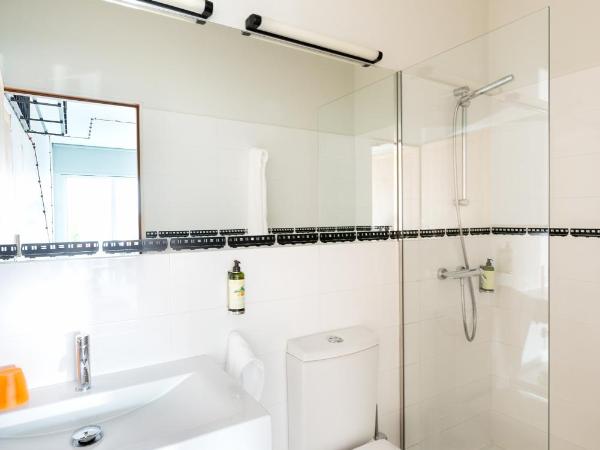 Pensao O Laranjeira : photo 6 de la chambre chambre lits jumeaux supérieure