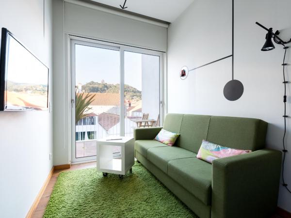 Pensao O Laranjeira : photo 4 de la chambre chambre double supérieure avec terrasse