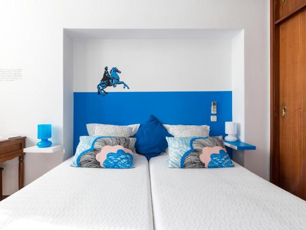 Pensao O Laranjeira : photo 2 de la chambre chambre lits jumeaux standard