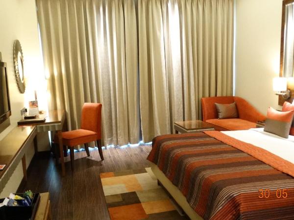 Ramada Gurgaon Central : photo 2 de la chambre premium queen room - non-smoking with happy hours (1+1 ;only applicable for imfl not all the brand at the bar),15% discount on f&b,inr 500 spa credit, early check-in for 03 hours