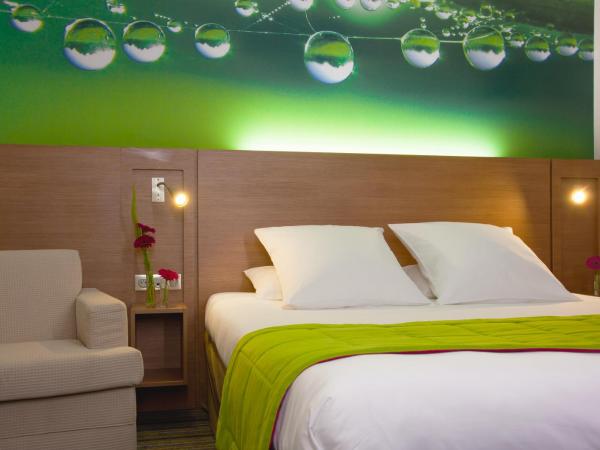 Mercure Quimper Centre : photo 2 de la chambre chambre supérieure avec chaise longue 