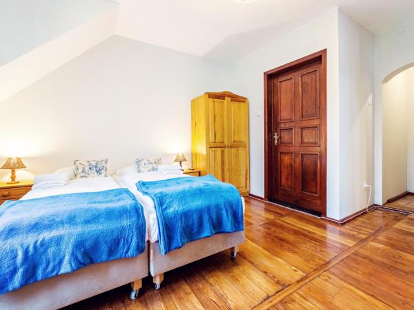Apartamenty EverySky - Willa Grota : photo 1 de la chambre chambre quadruple avec salle de bains