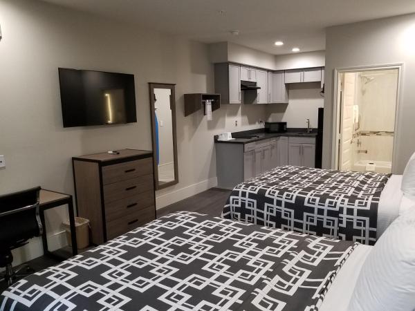 Palace Inn Blue Tomball Parkway : photo 6 de la chambre studio lit queen-size de luxe