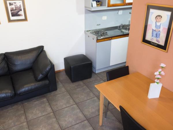 Rosario Suites : photo 6 de la chambre appartement standard avec lit double