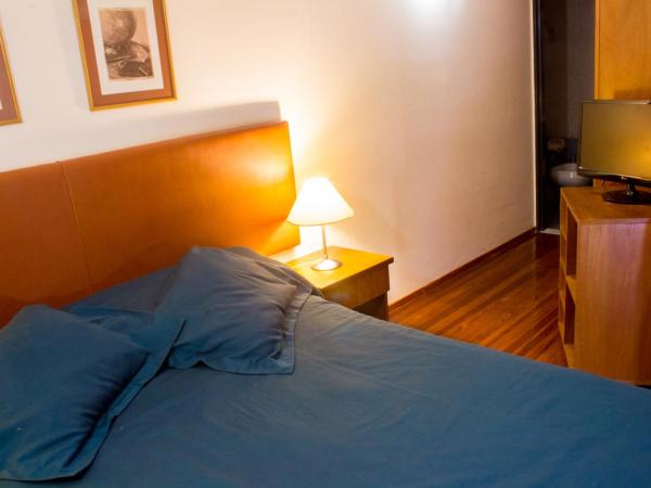 Rosario Suites : photo 5 de la chambre appartement standard avec lit double