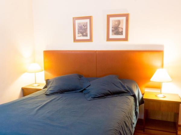 Rosario Suites : photo 4 de la chambre appartement standard avec lit double