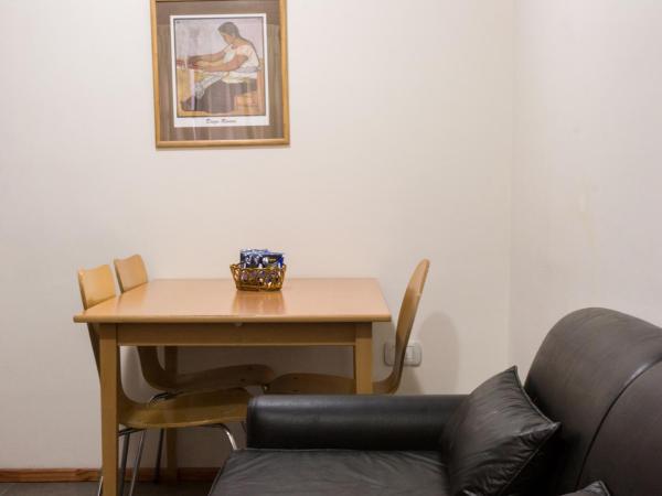 Rosario Suites : photo 3 de la chambre appartement standard avec lit double