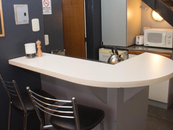 Rosario Suites : photo 1 de la chambre appartement standard avec lit double