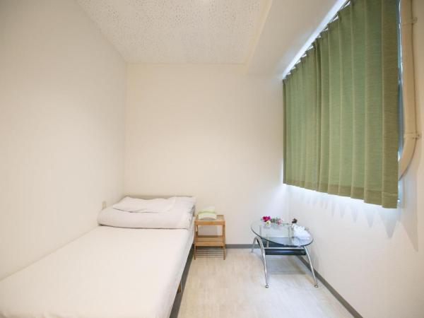 123 Guesthouse : photo 3 de la chambre triple room with shared bathroom - a