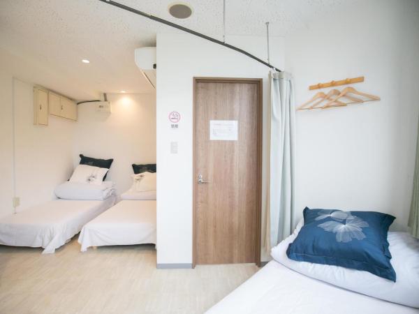 123 Guesthouse : photo 3 de la chambre triple room with shared bathroom - b