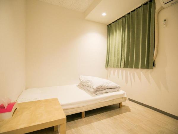 123 Guesthouse : photo 2 de la chambre single room with shared bathroom - d