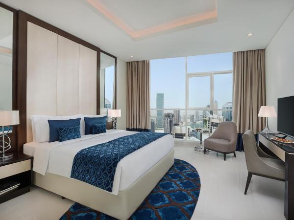 DAMAC Maison Distinction : photo 2 de la chambre suite 1 chambre - vue partielle sur burj khalifa